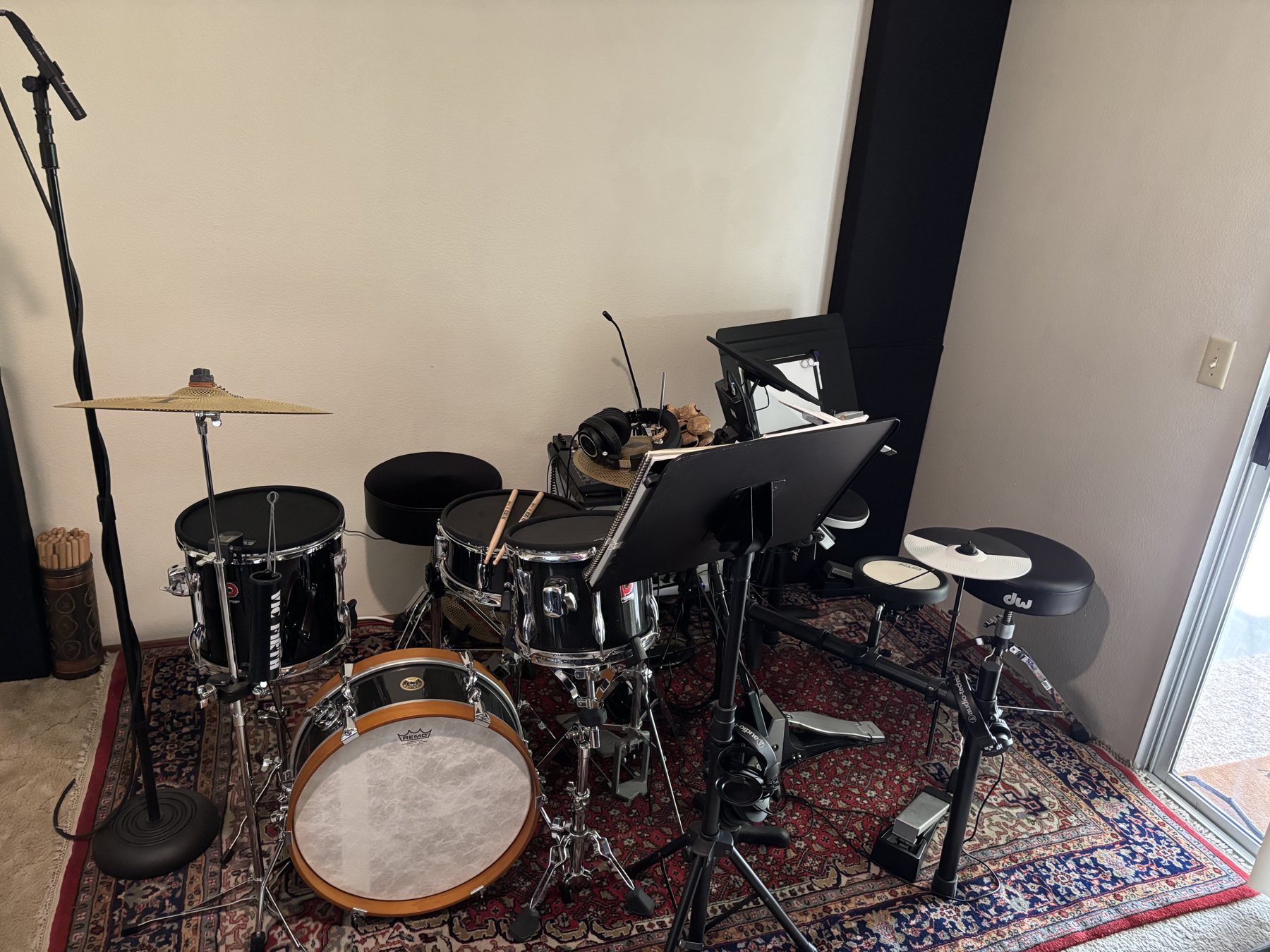 Acoustic and electronic drum kits arranged for private lessons